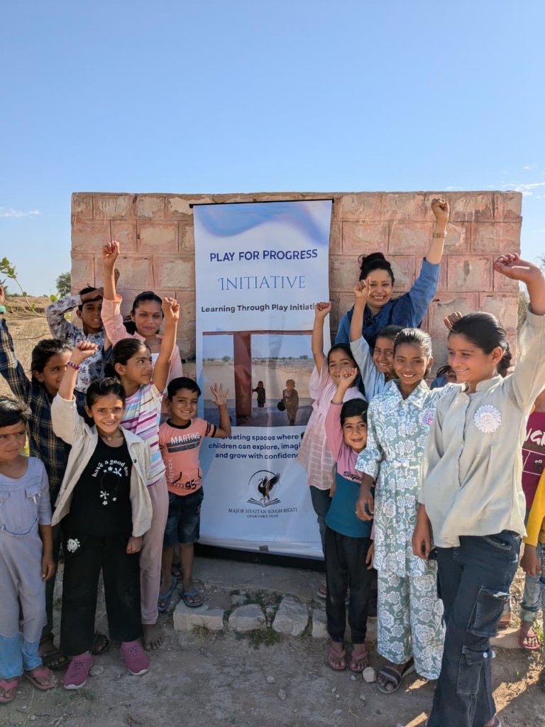 Play for Progress - Children with banner